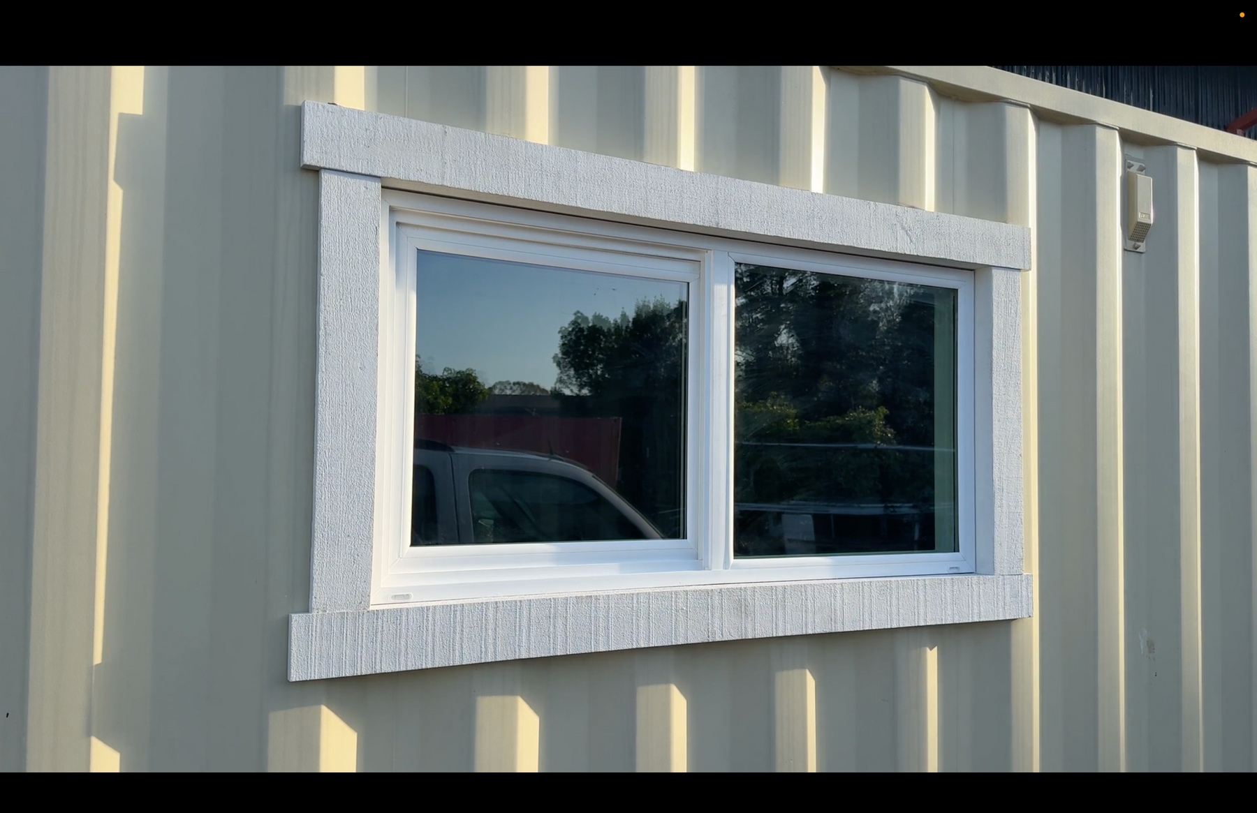 ContainerREADY residential window installed in a shipping container